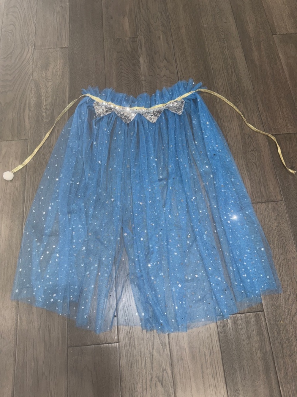 Blue Star and moon sparkle Tulle cape with silver sequence trim and a gold tie